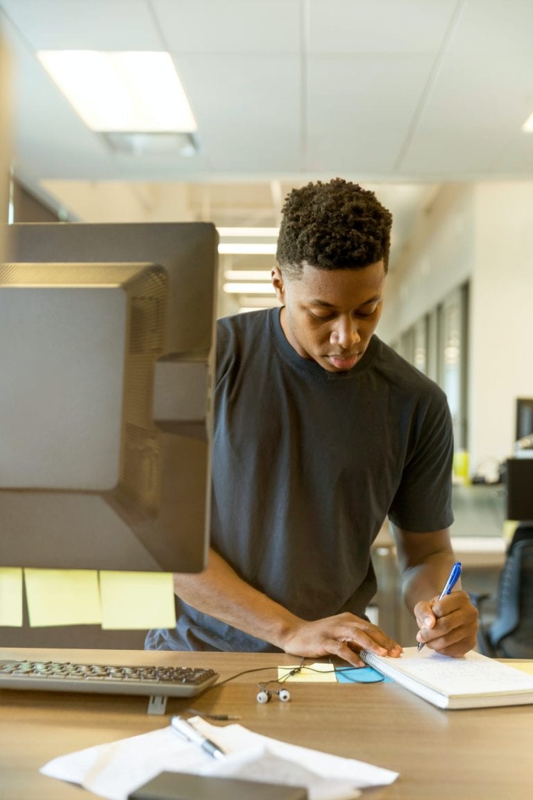 Man Working Out Interim Day Rates